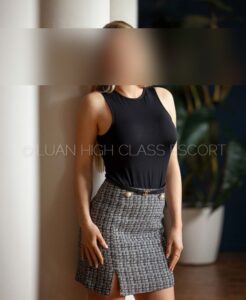 smart escort lady in a business outfit
